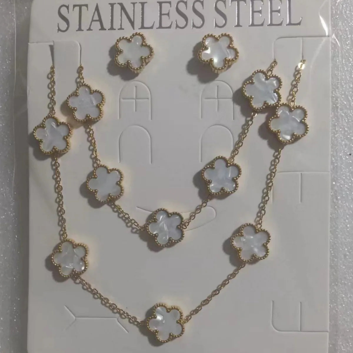 Conjunto de joias de trevo