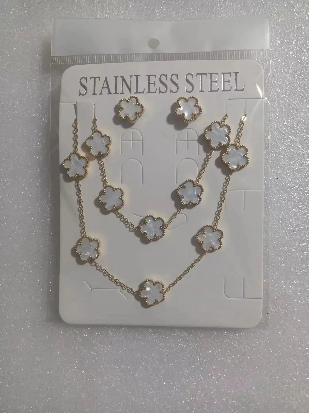 Conjunto de joias de trevo