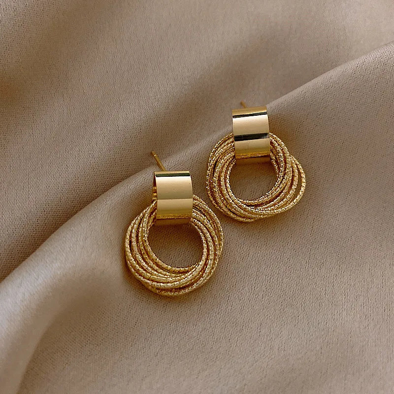Brincos de pino