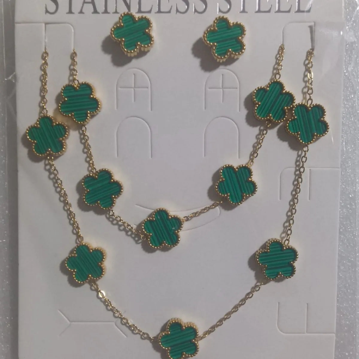 Conjunto de joias de trevo